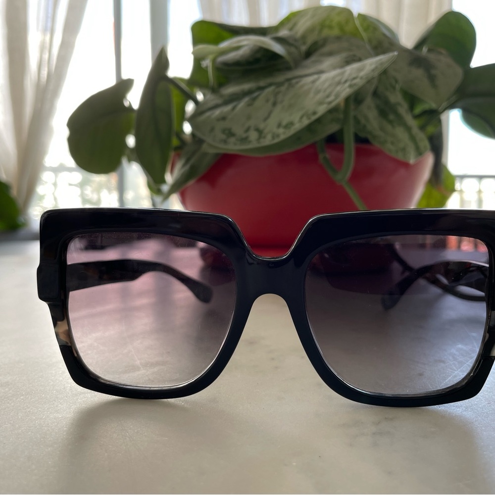 Black square frame sunglasses by Perverse